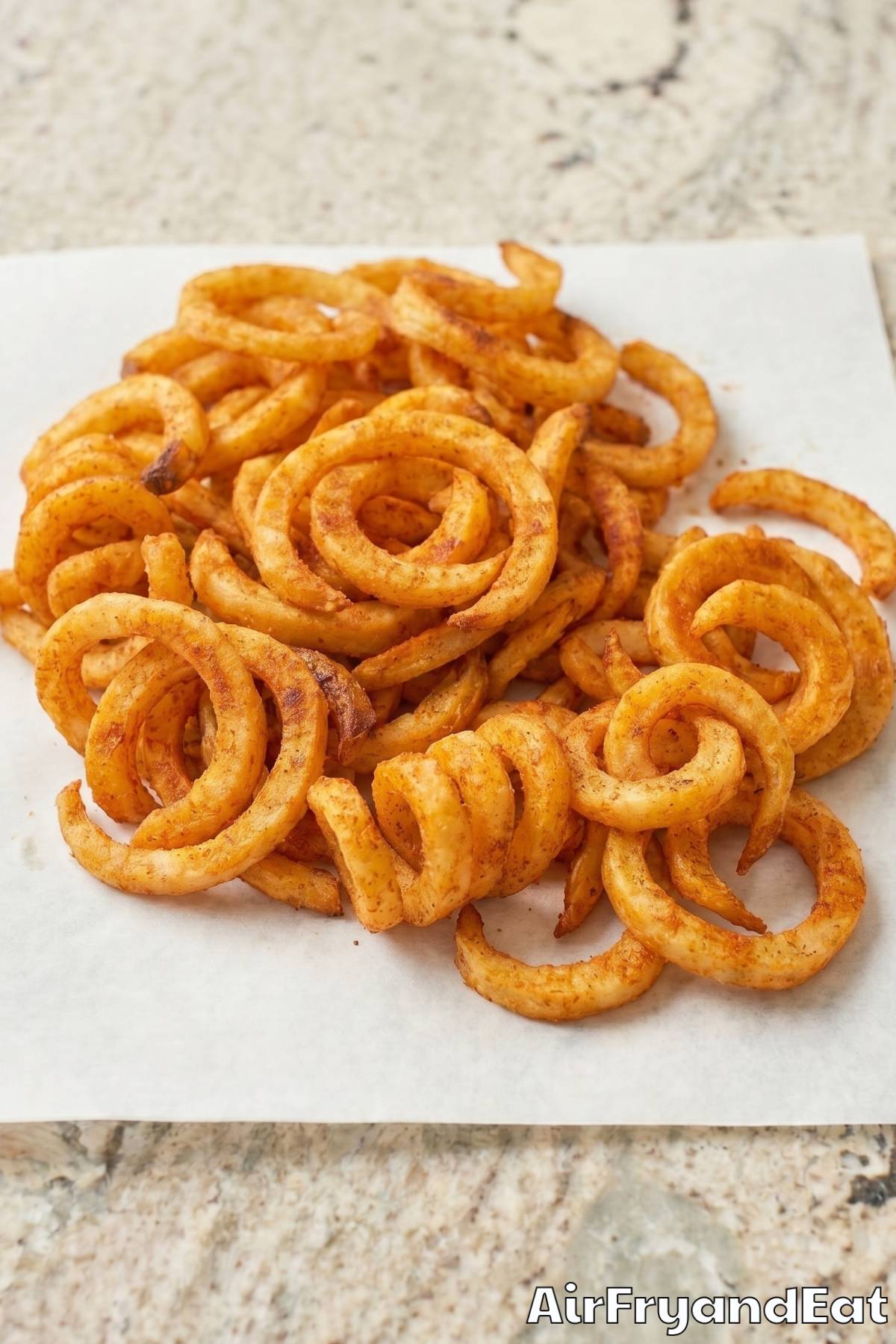 Perfectly cooked air fryer curly fries