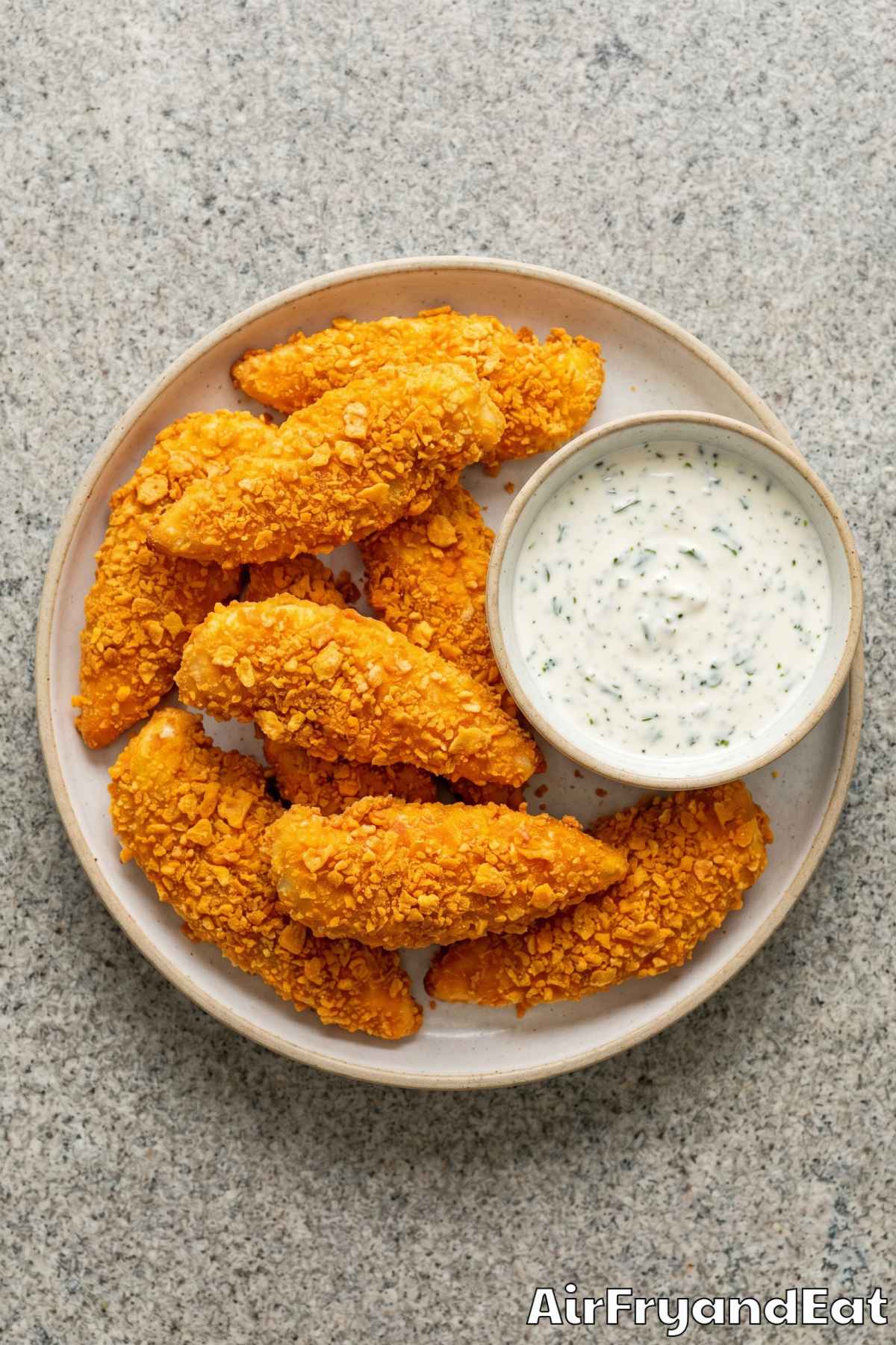 Golden air fryer Dorito chicken pieces