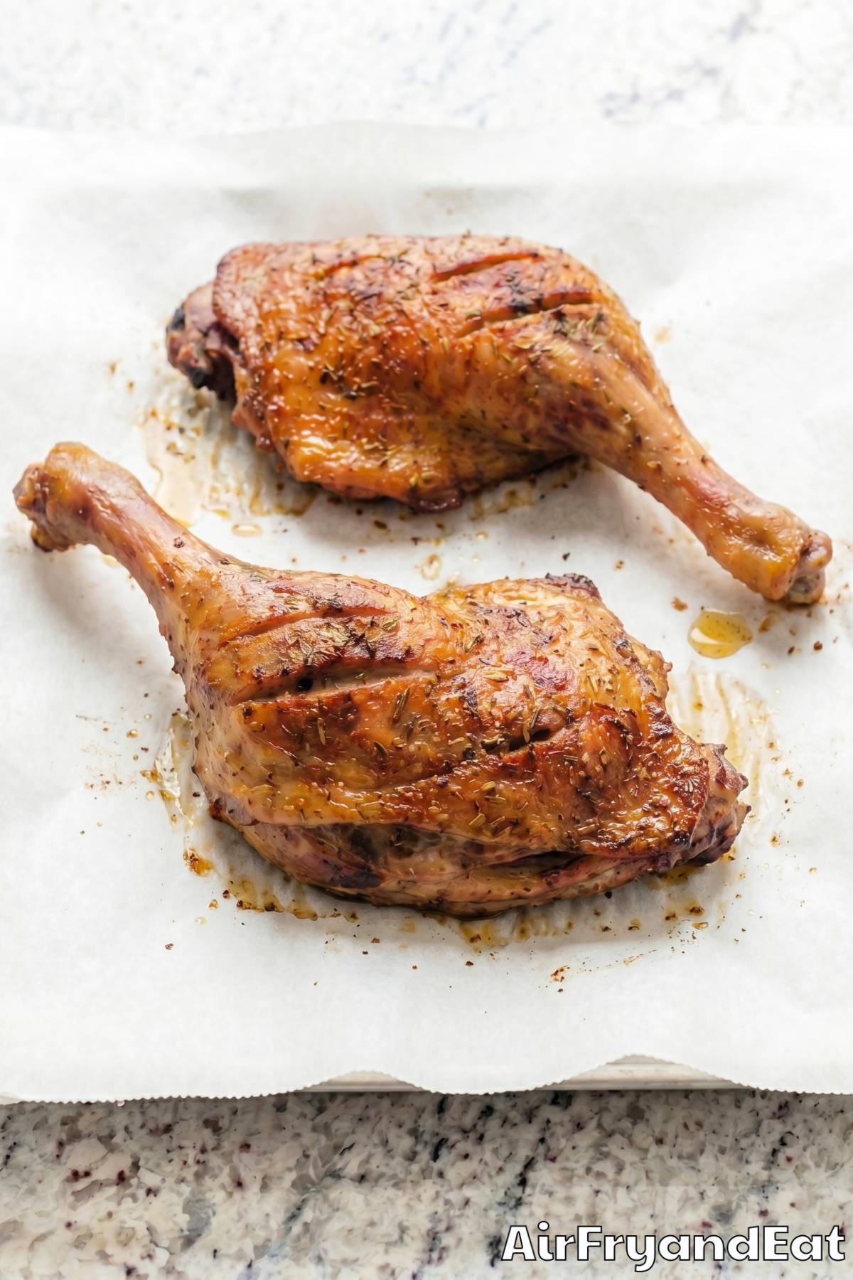 Savory air fryer duck legs on a platter