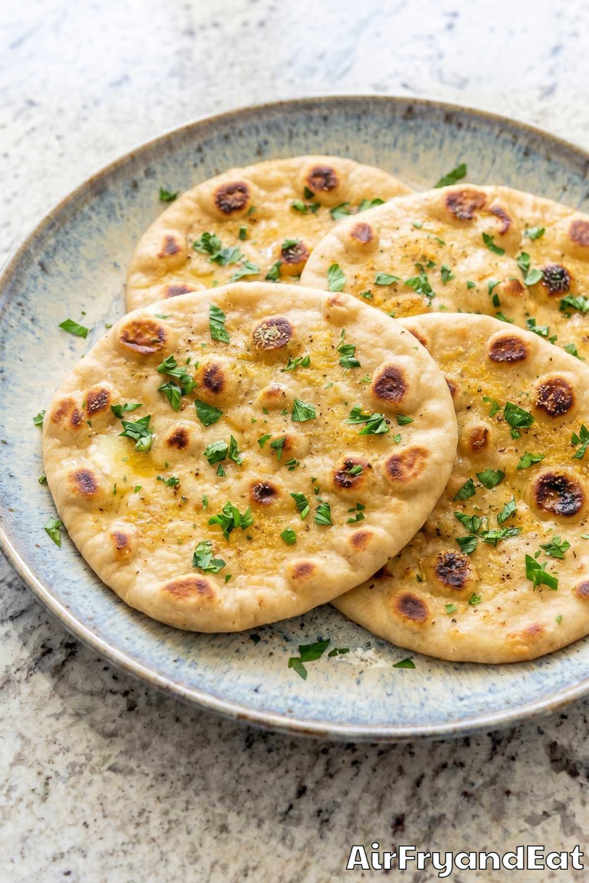 Buttery air fryer flatbread on a board