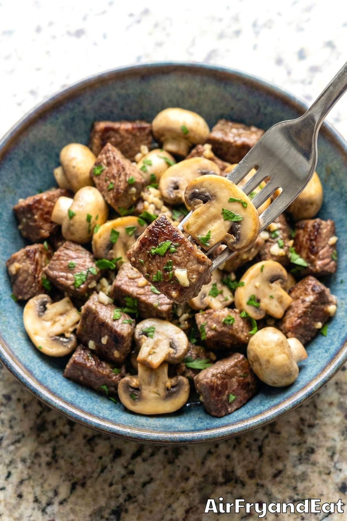 Easy air fryer garlic butter steak & mushrooms