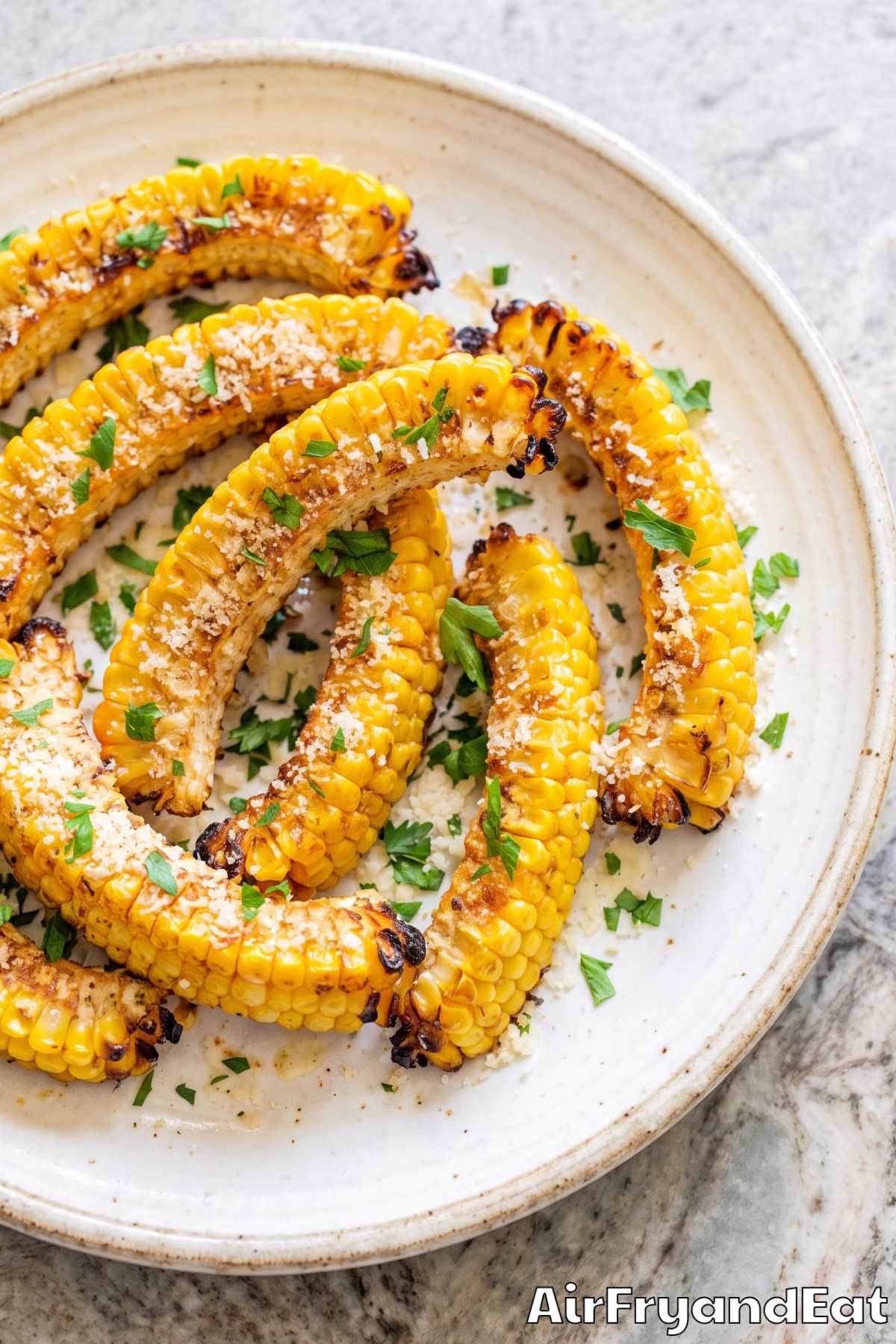 Crispy air fryer garlic parmesan corn ribs