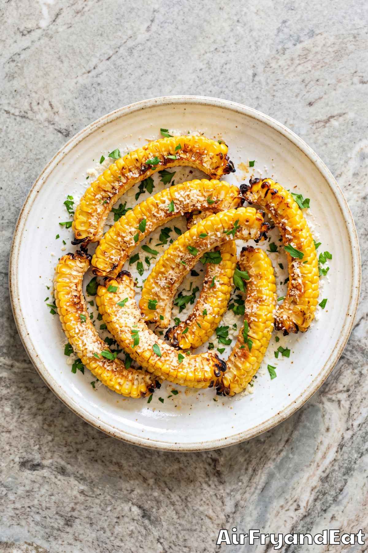 Air fryer corn ribs with parmesan