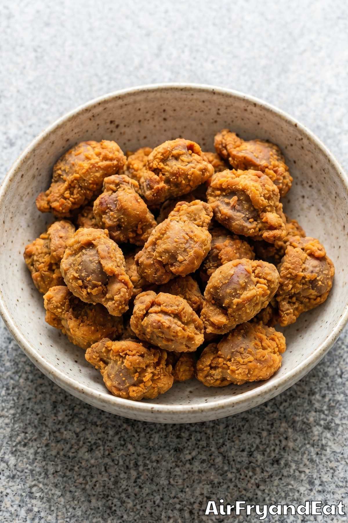 Homemade air fryer gizzards piled high