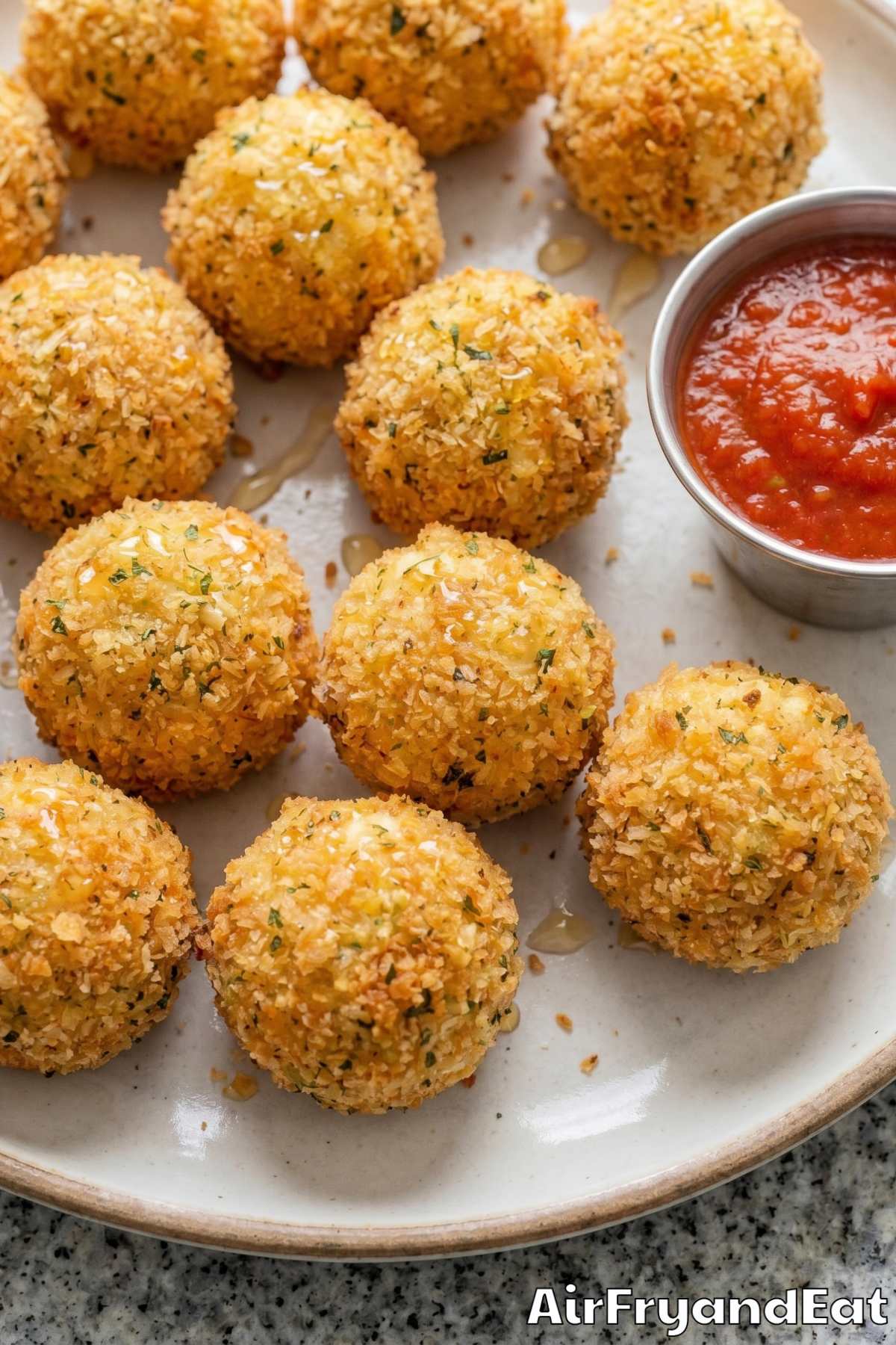 Warm air fryer goat cheese balls on a plate