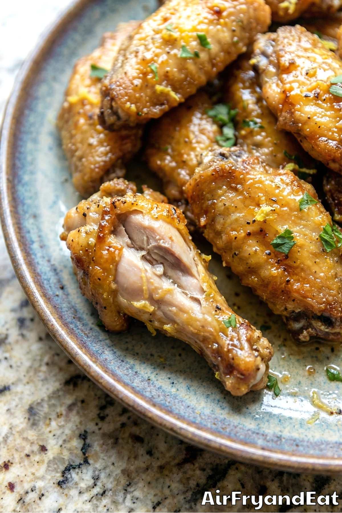 Zesty honey lemon pepper wings on a plate