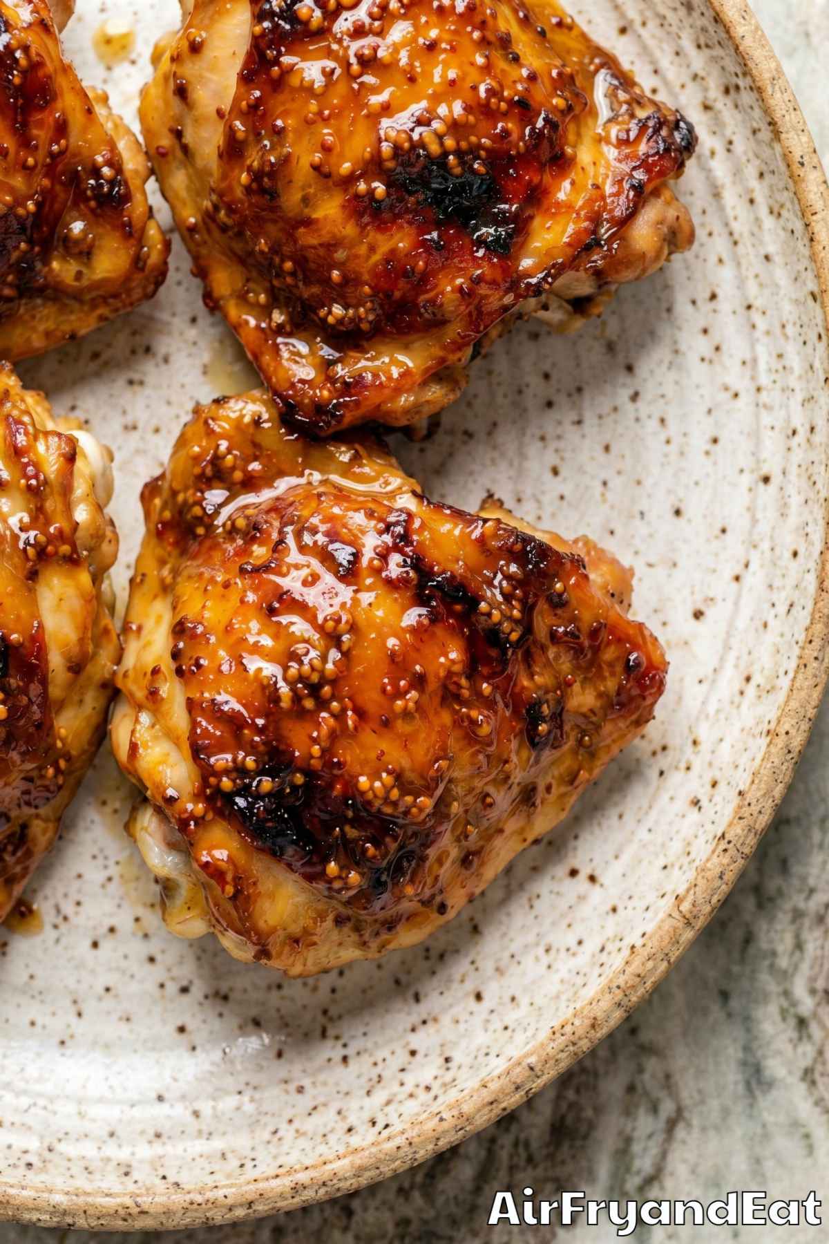 Easy air fryer honey mustard chicken on plate