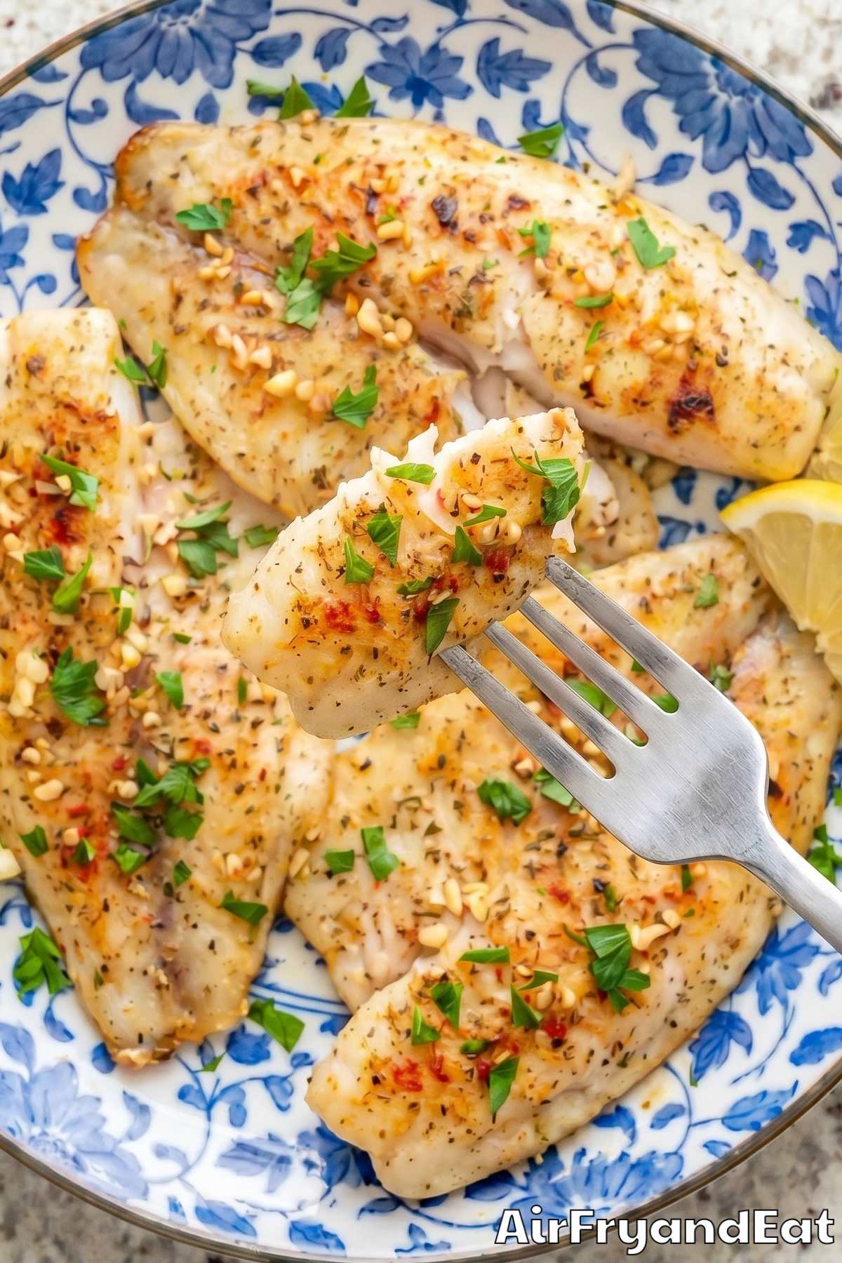 Light air fryer lemon garlic tilapia dinner
