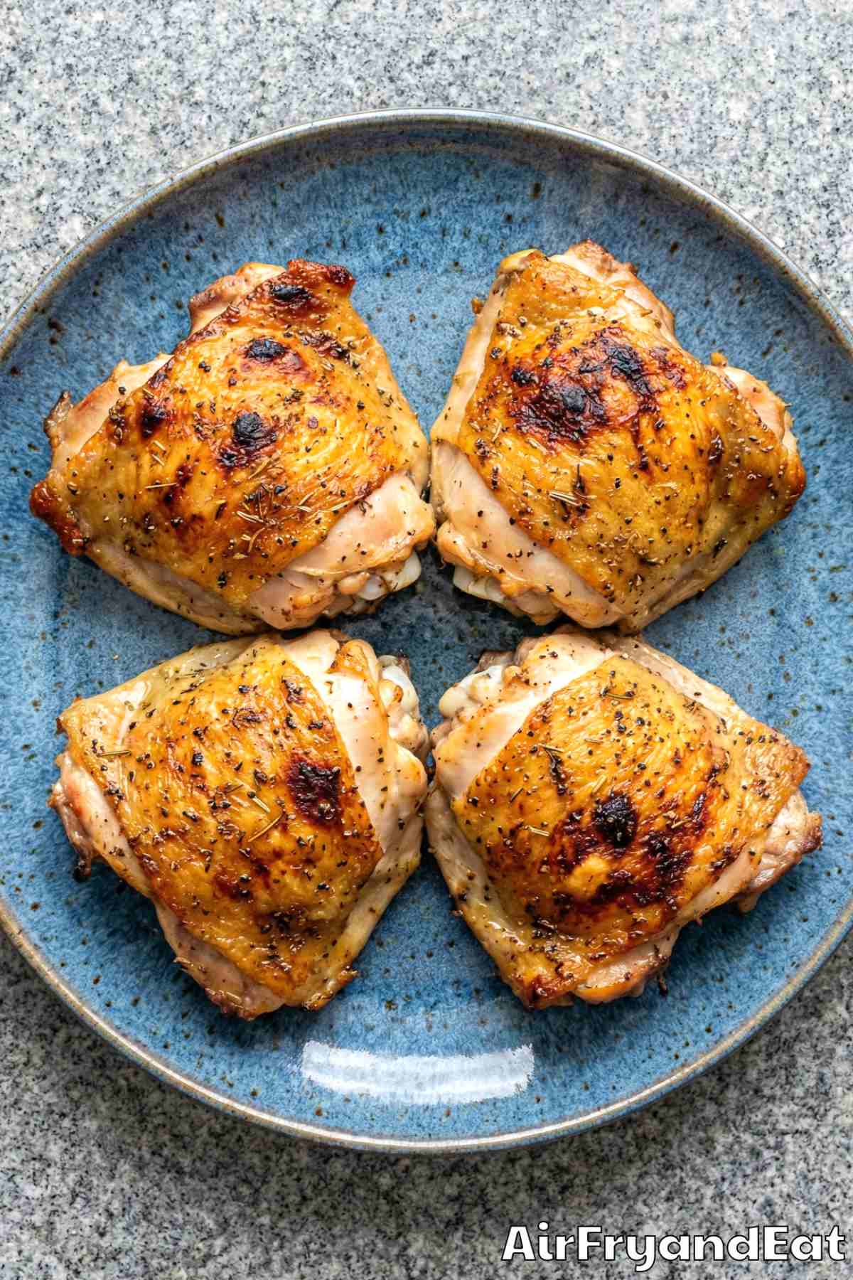 Savory air fryer lemon herb chicken thighs