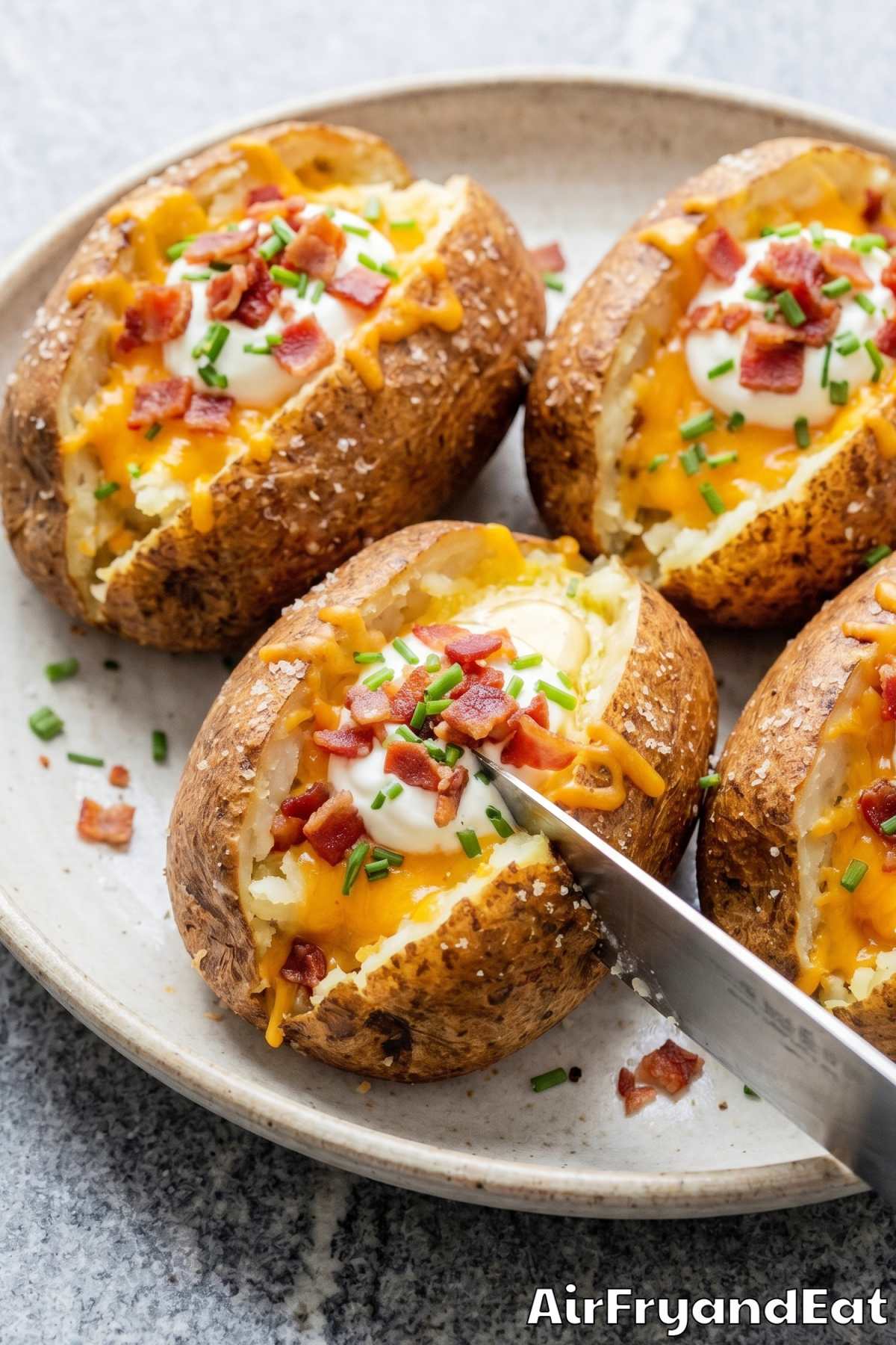 Comforting air fryer loaded baked potatoes