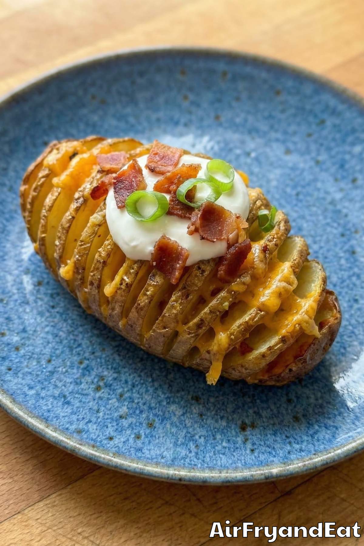 Cheesy air fryer loaded hasselback potatoes