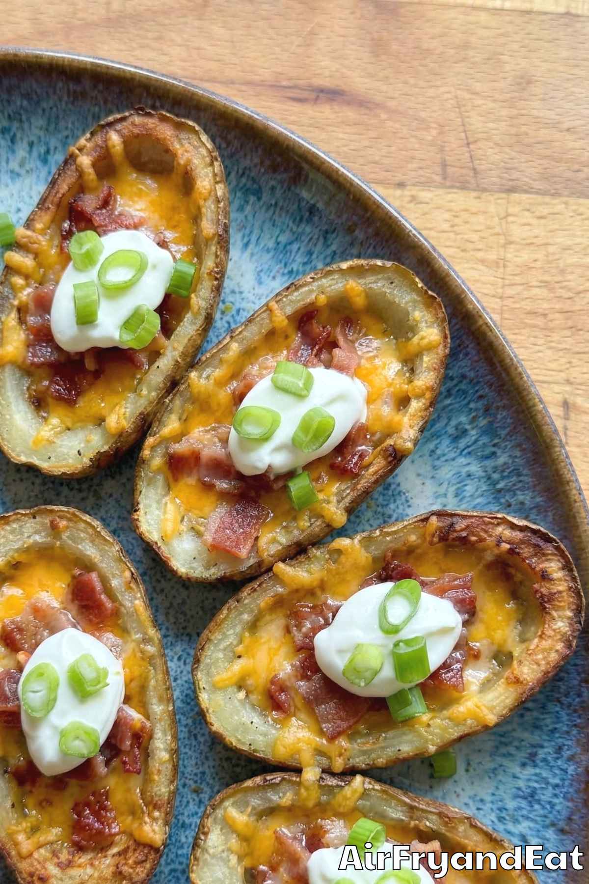 Easy air fryer loaded potato skins ready to serve