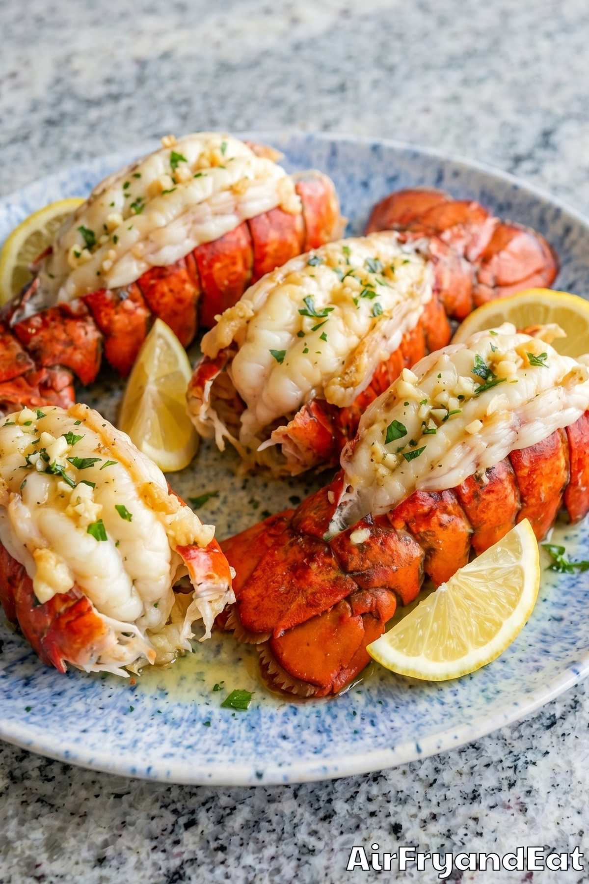 Easy air fryer lobster tails ready to serve