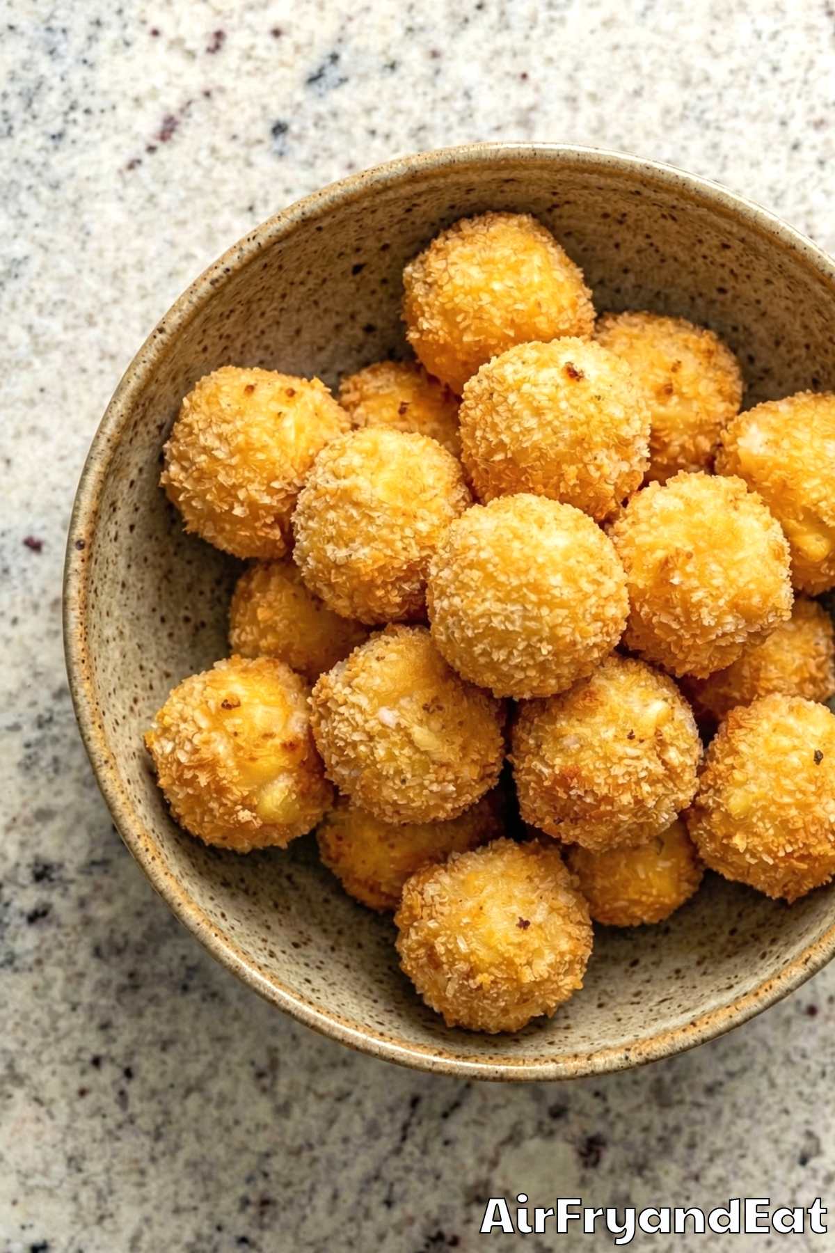 Savory air fryer mac & cheese bites on a tray
