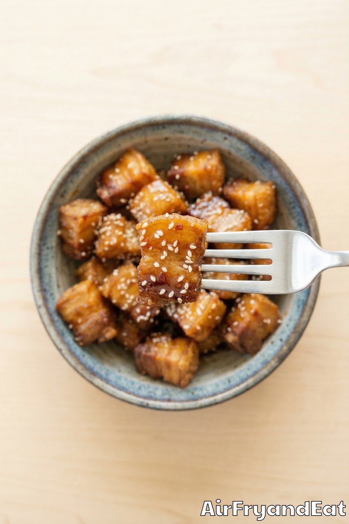Tender maple glazed pork belly bites close-up