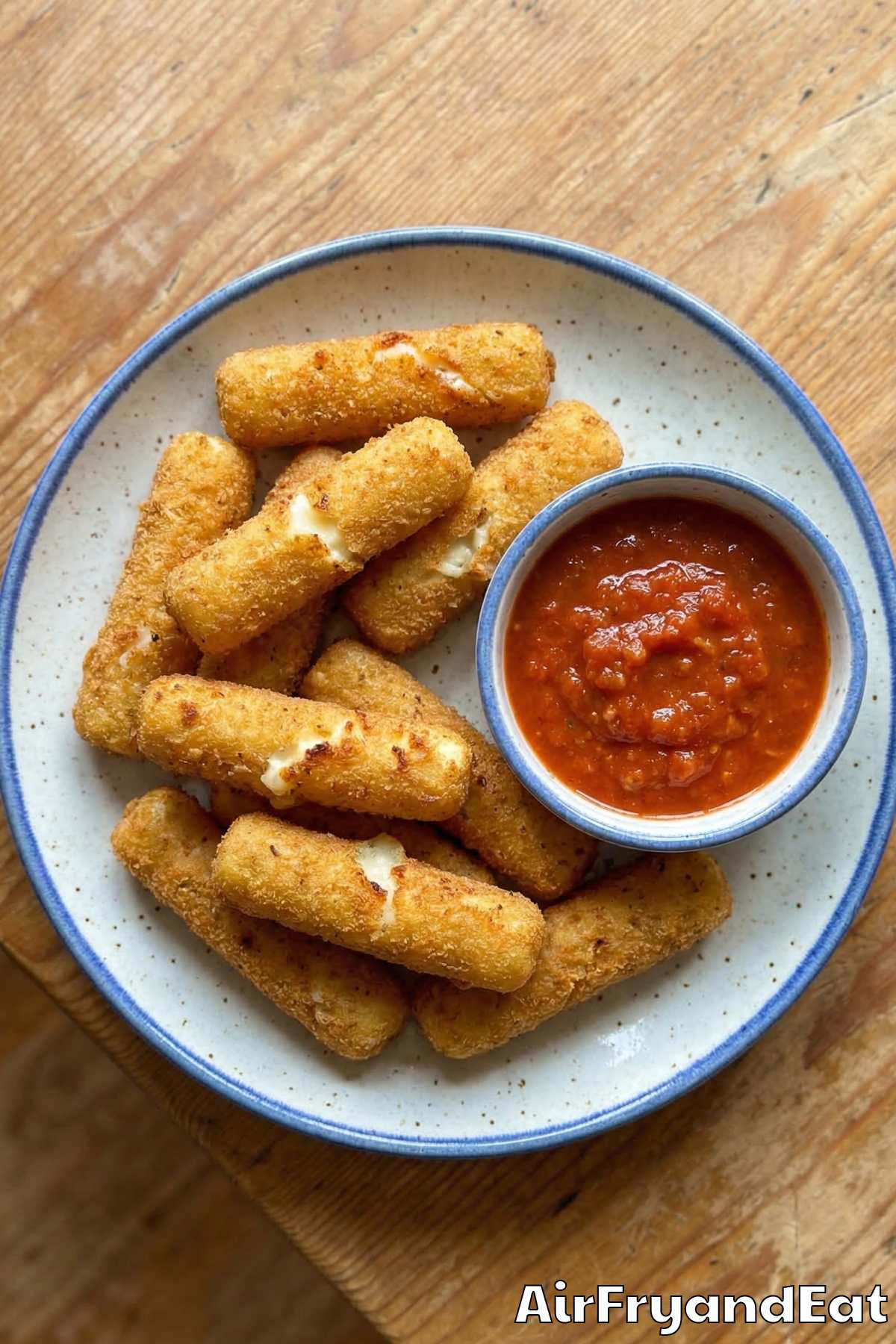 Crunchy air fryer mozzarella sticks stacked