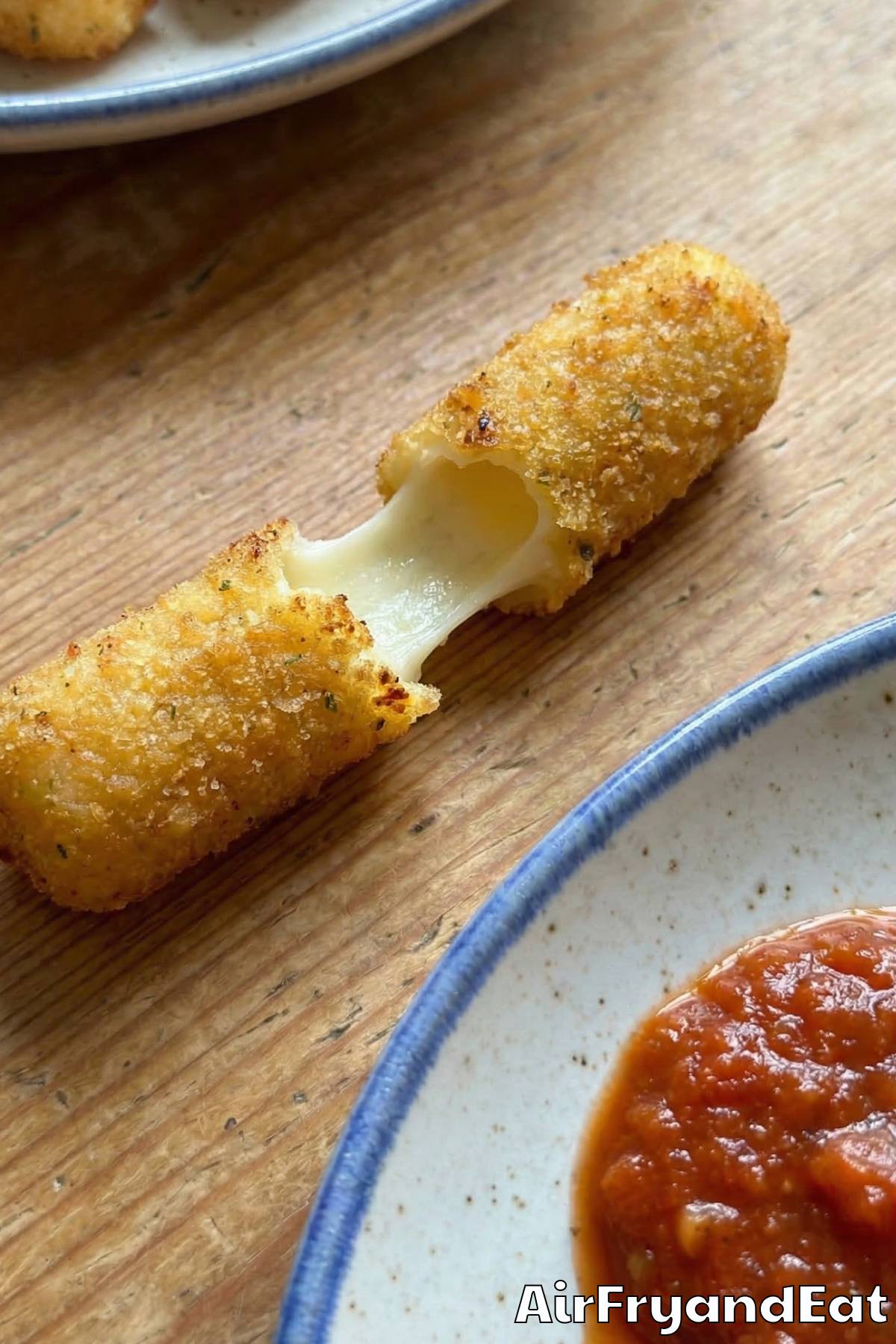 Easy air fryer mozzarella sticks with sauce