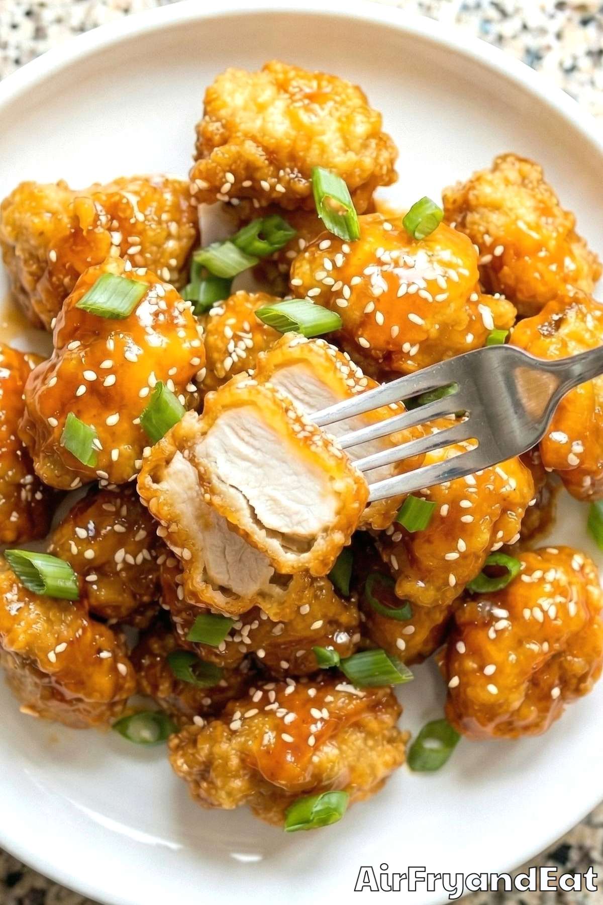 Golden air fryer orange chicken close-up