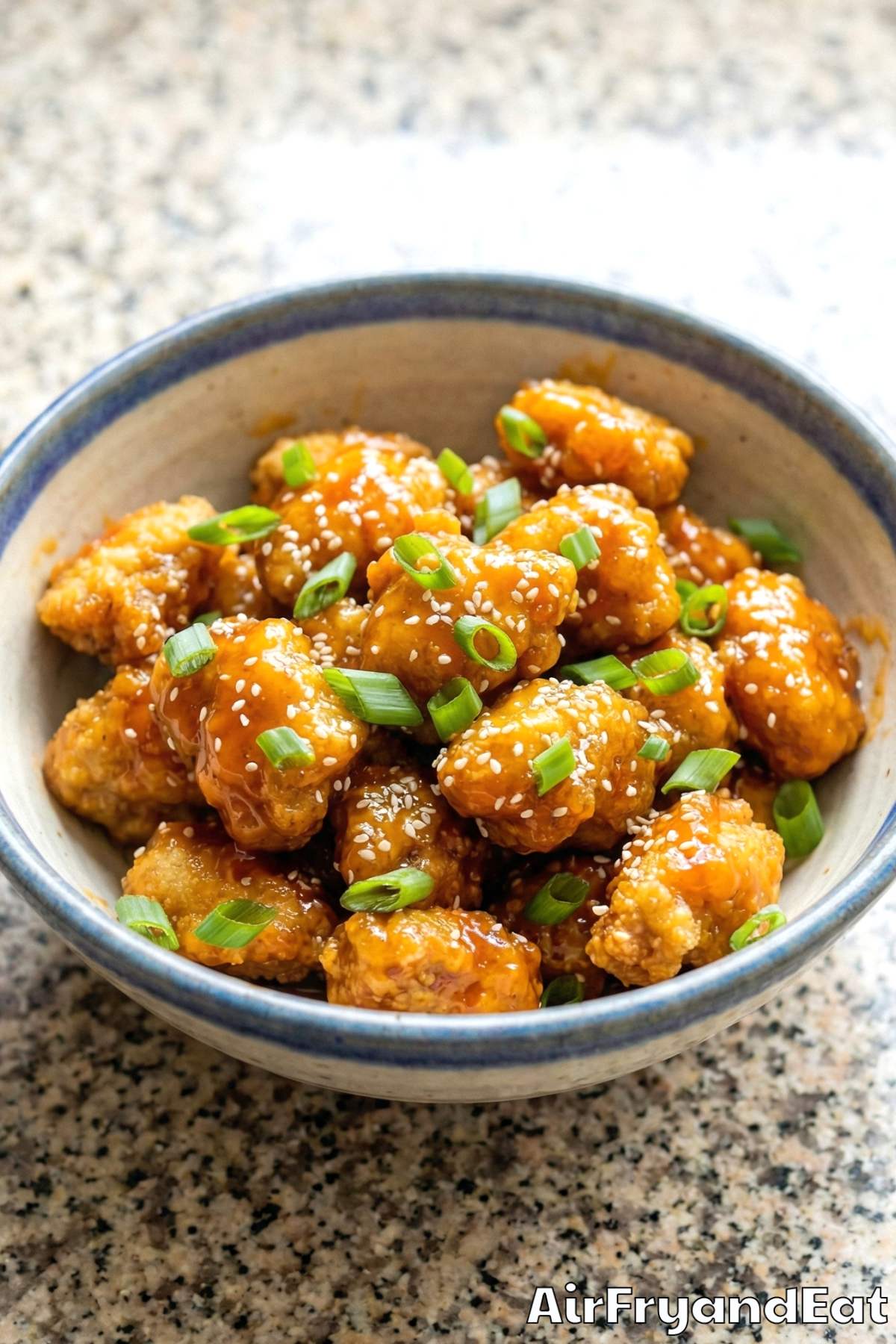 Sticky air fryer orange chicken served fresh