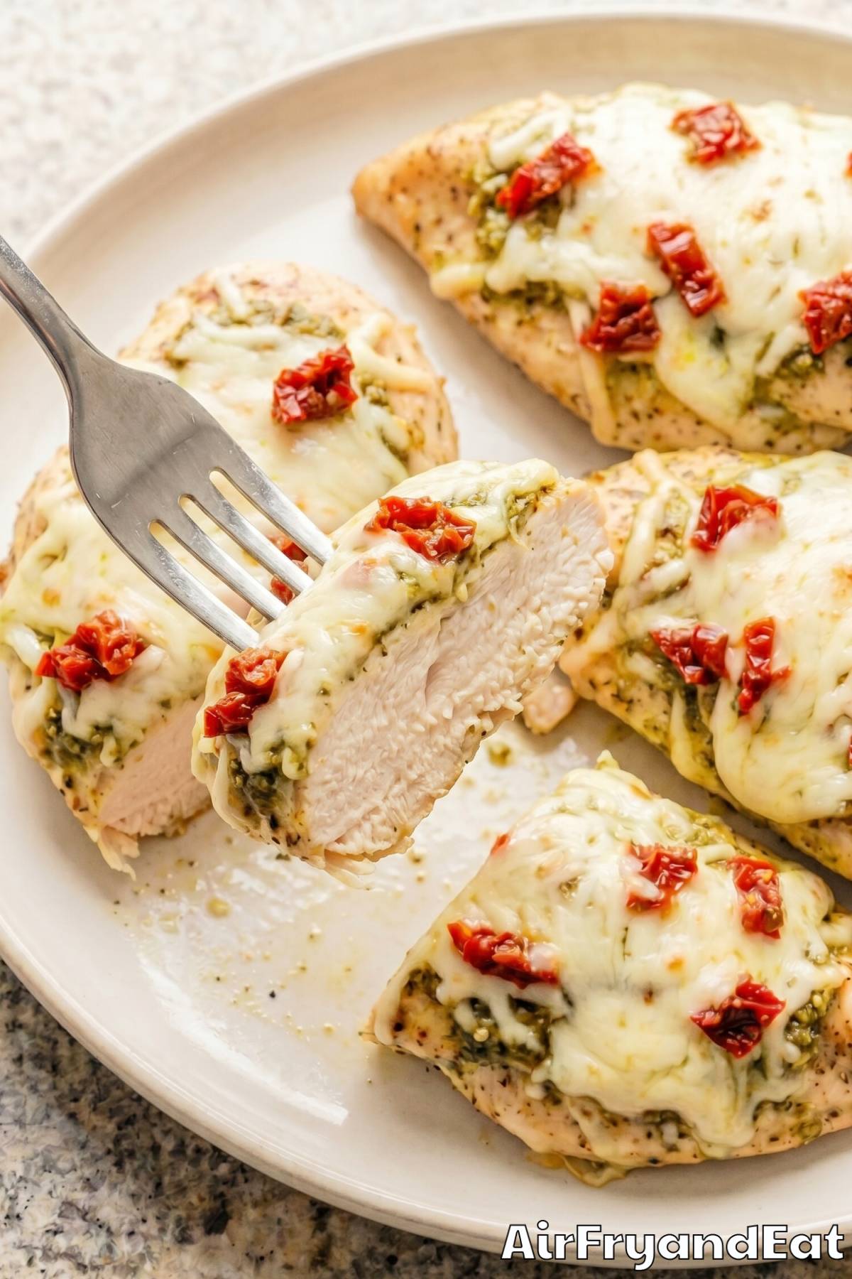 Flavorful air fryer pesto chicken plated