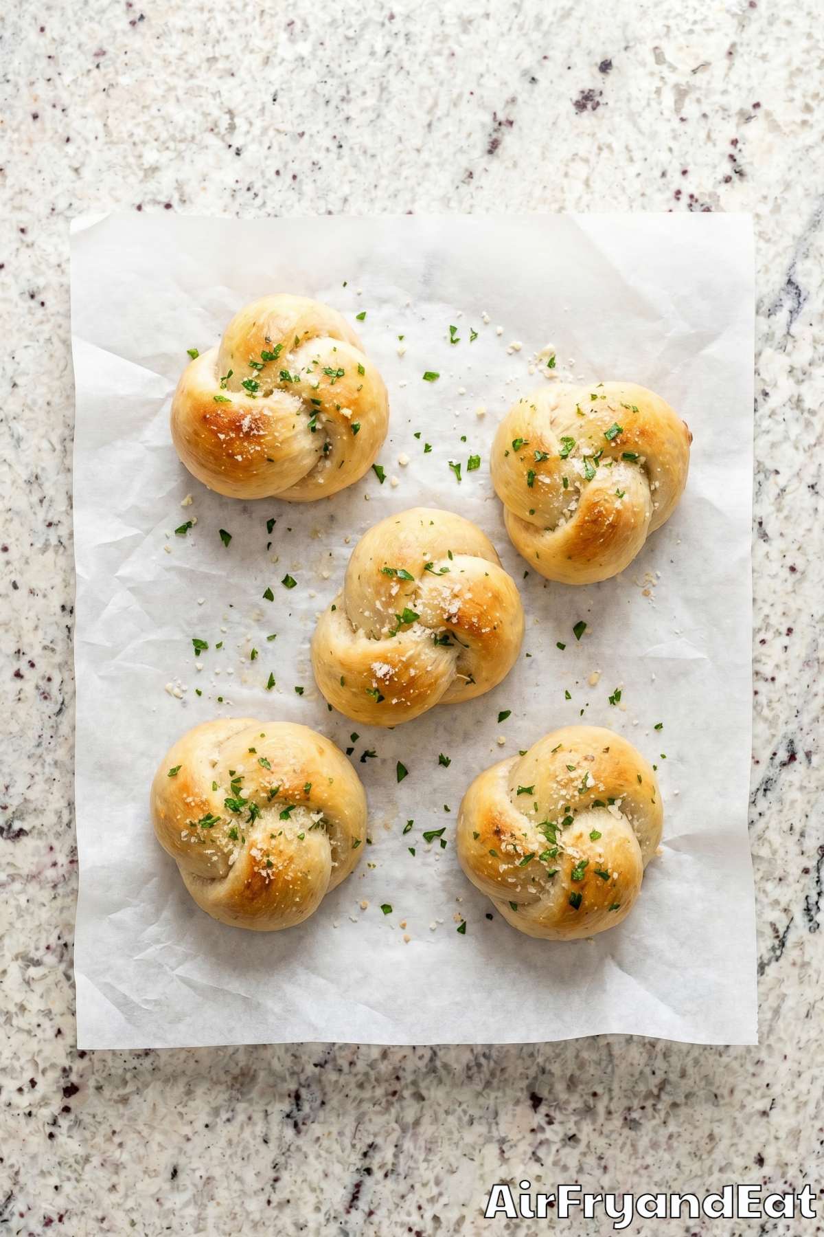 buttery garlic pizza knots on a plate