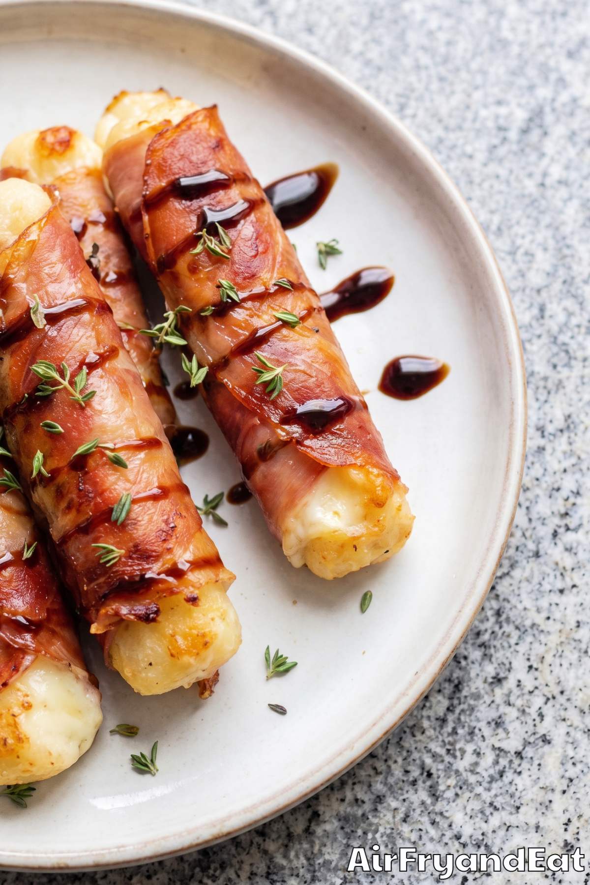 Savory prosciutto wrapped cheese bites