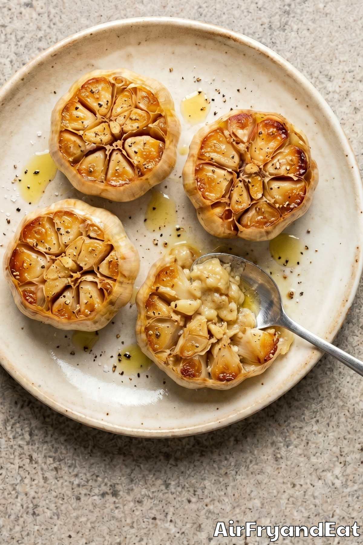 Buttery air fryer roasted garlic close up