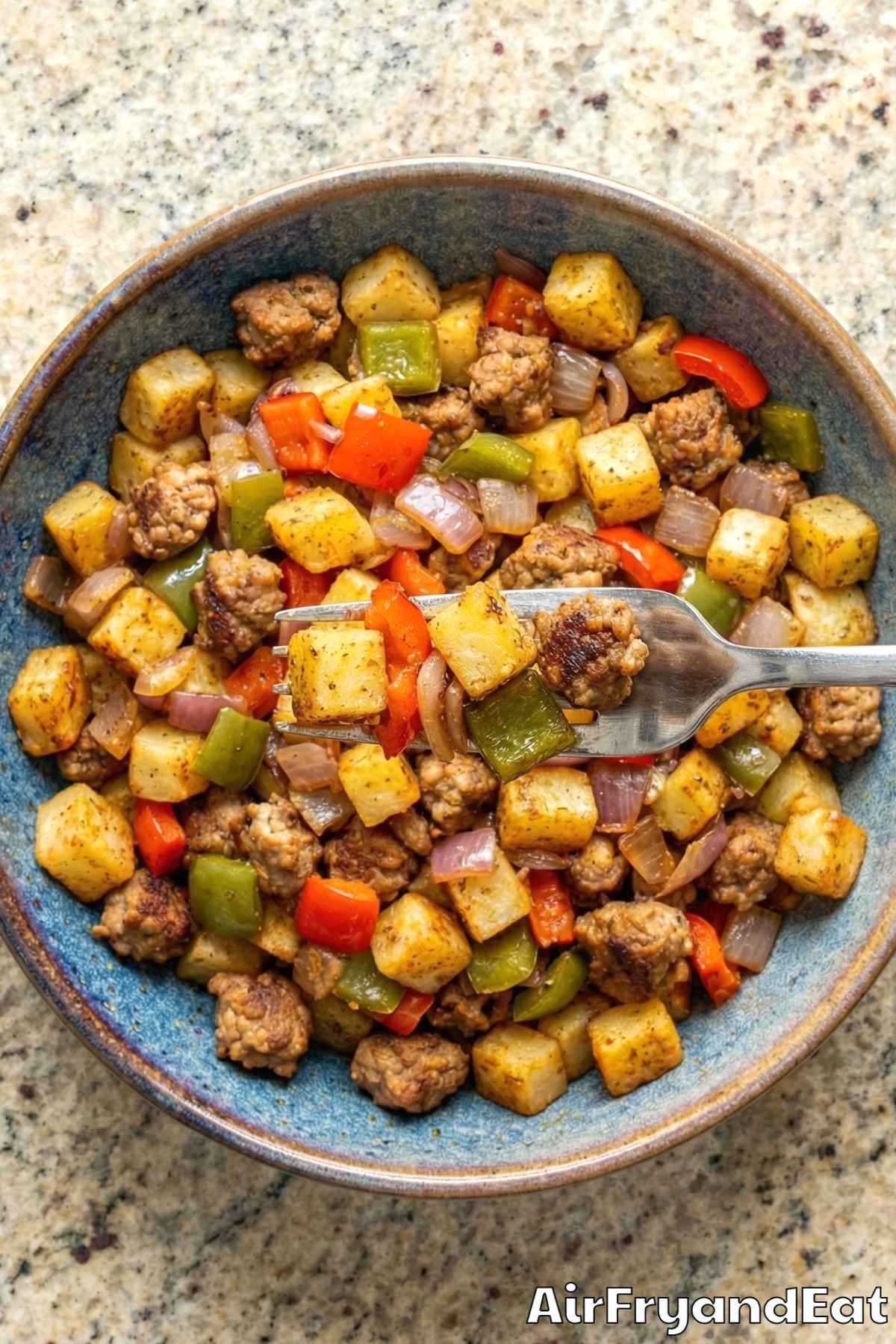 Golden sausage & pepper breakfast hash close-up