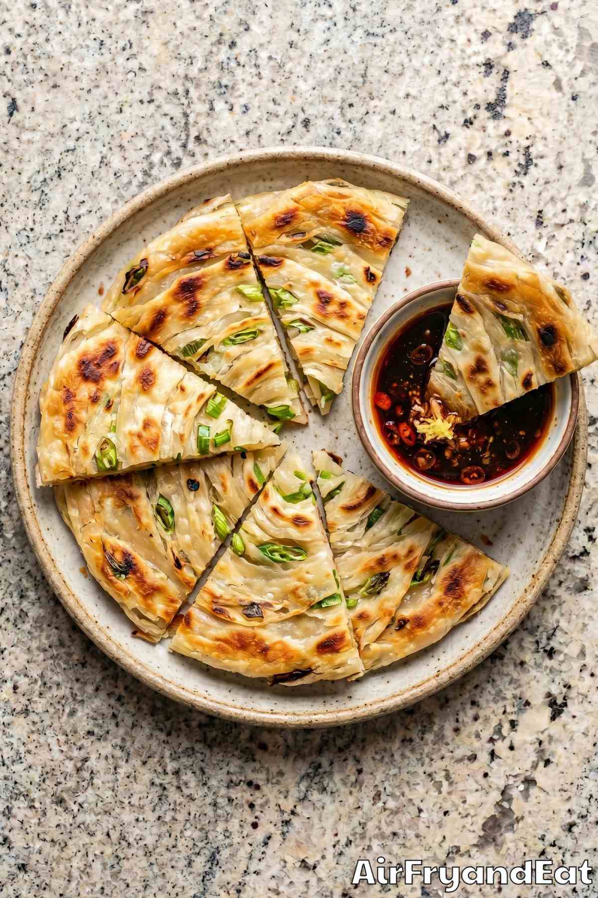 Flaky air fryer scallion pancakes stacked