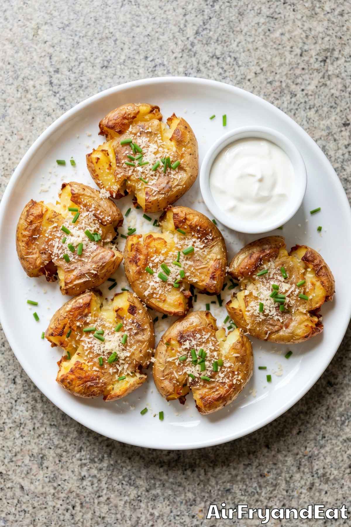 Savory air fryer smashed potatoes with herbs