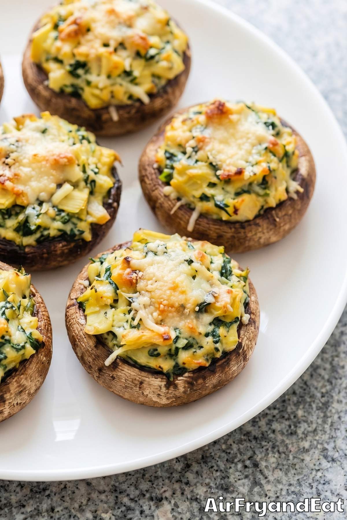creamy spinach artichoke stuffed mushrooms