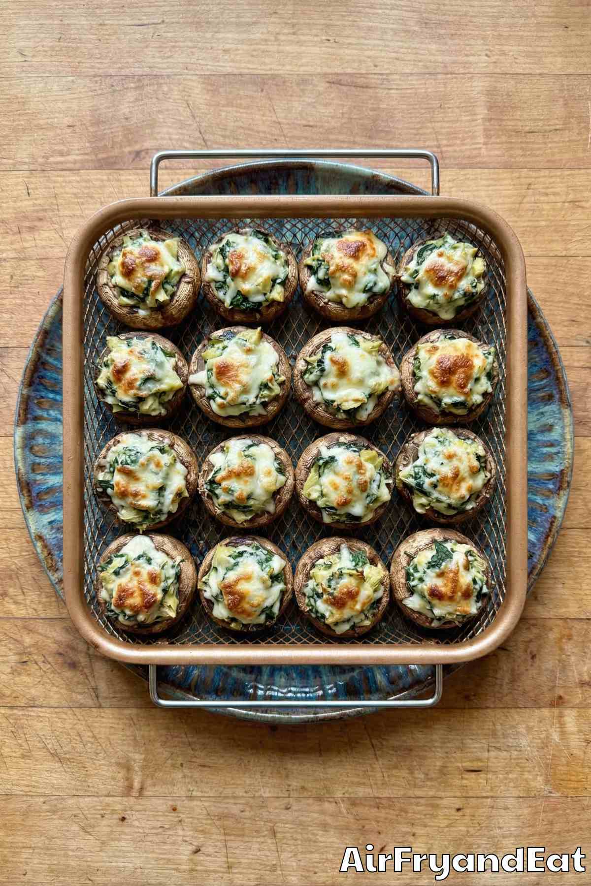 Bubbly spinach artichoke stuffed mushrooms