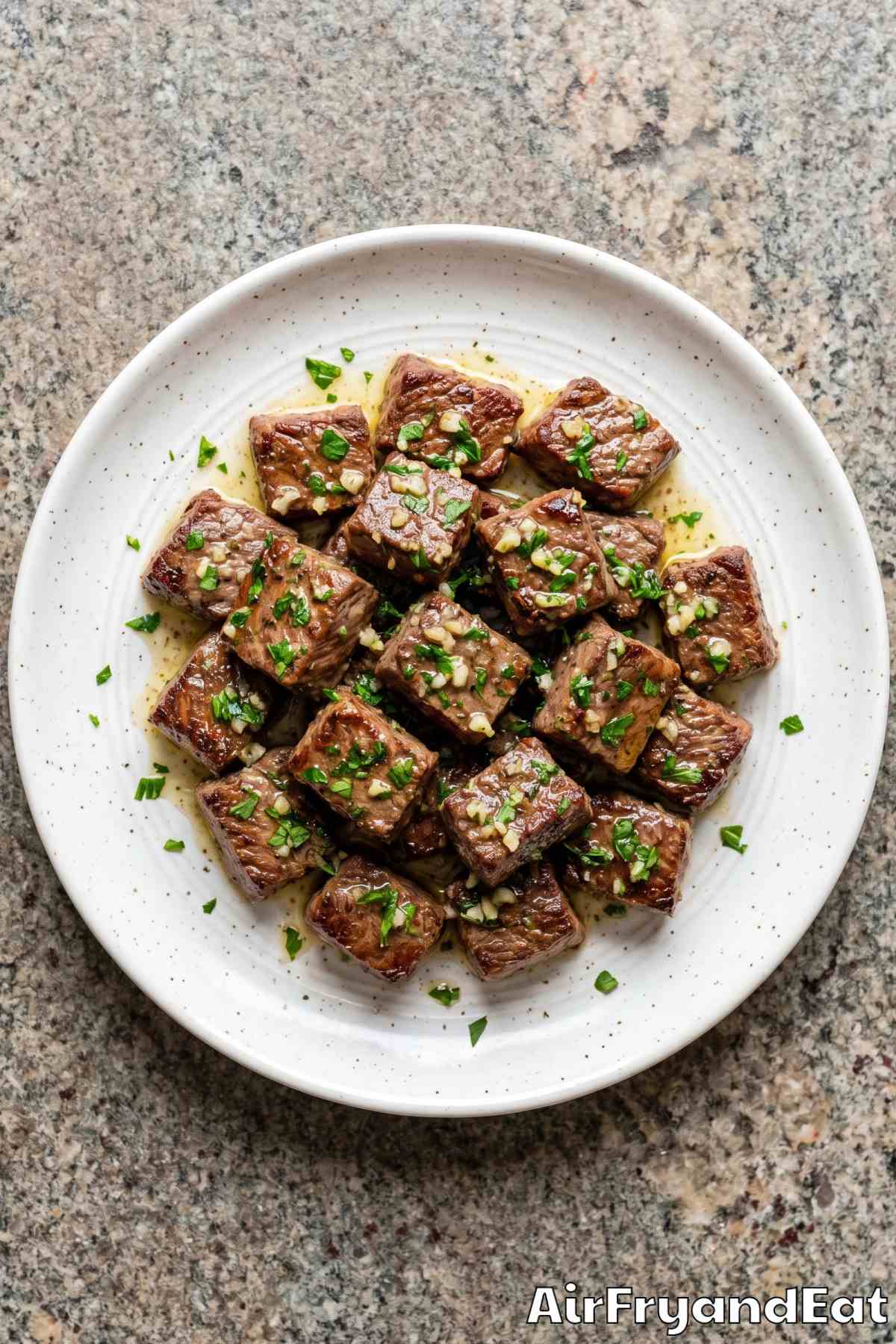 savory garlic butter steak bites on a plate