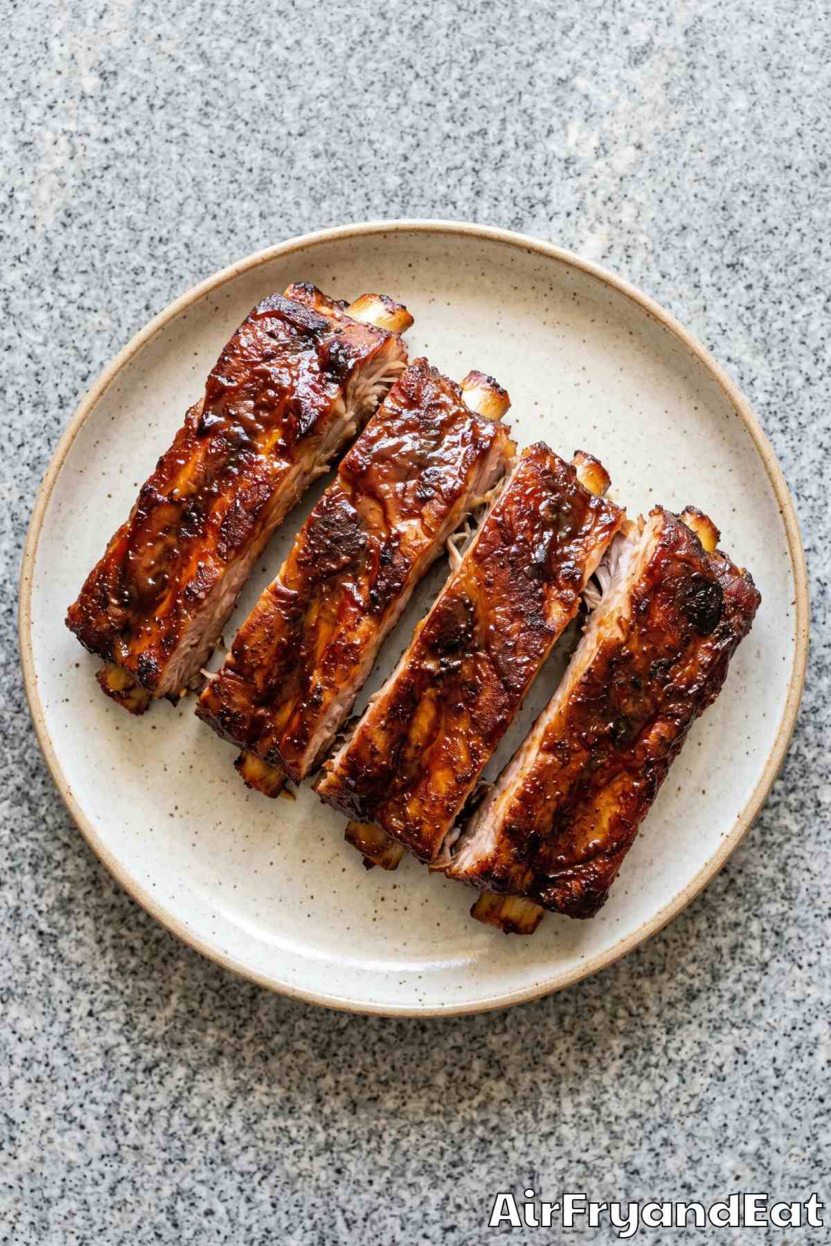 rich sticky BBQ pork ribs close up