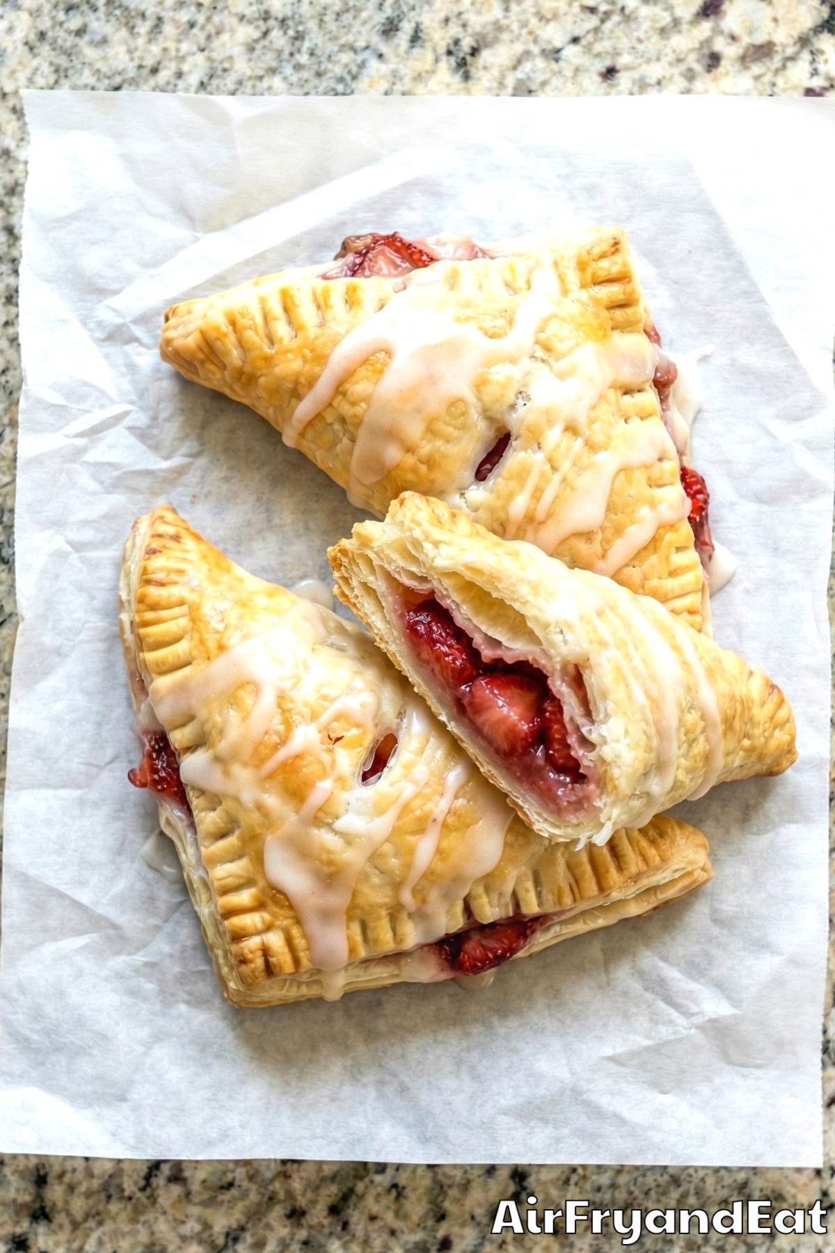 Sweet air fryer strawberry turnovers sliced open