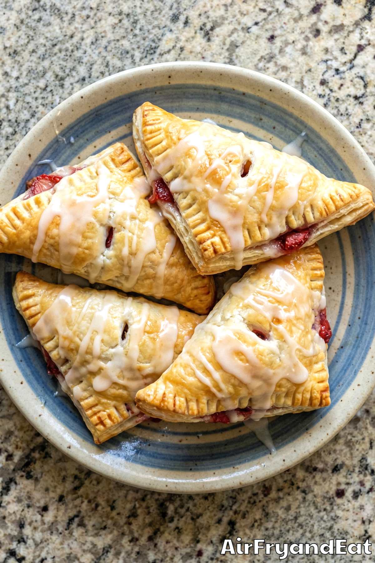 Crispy air fryer strawberry turnovers stacked