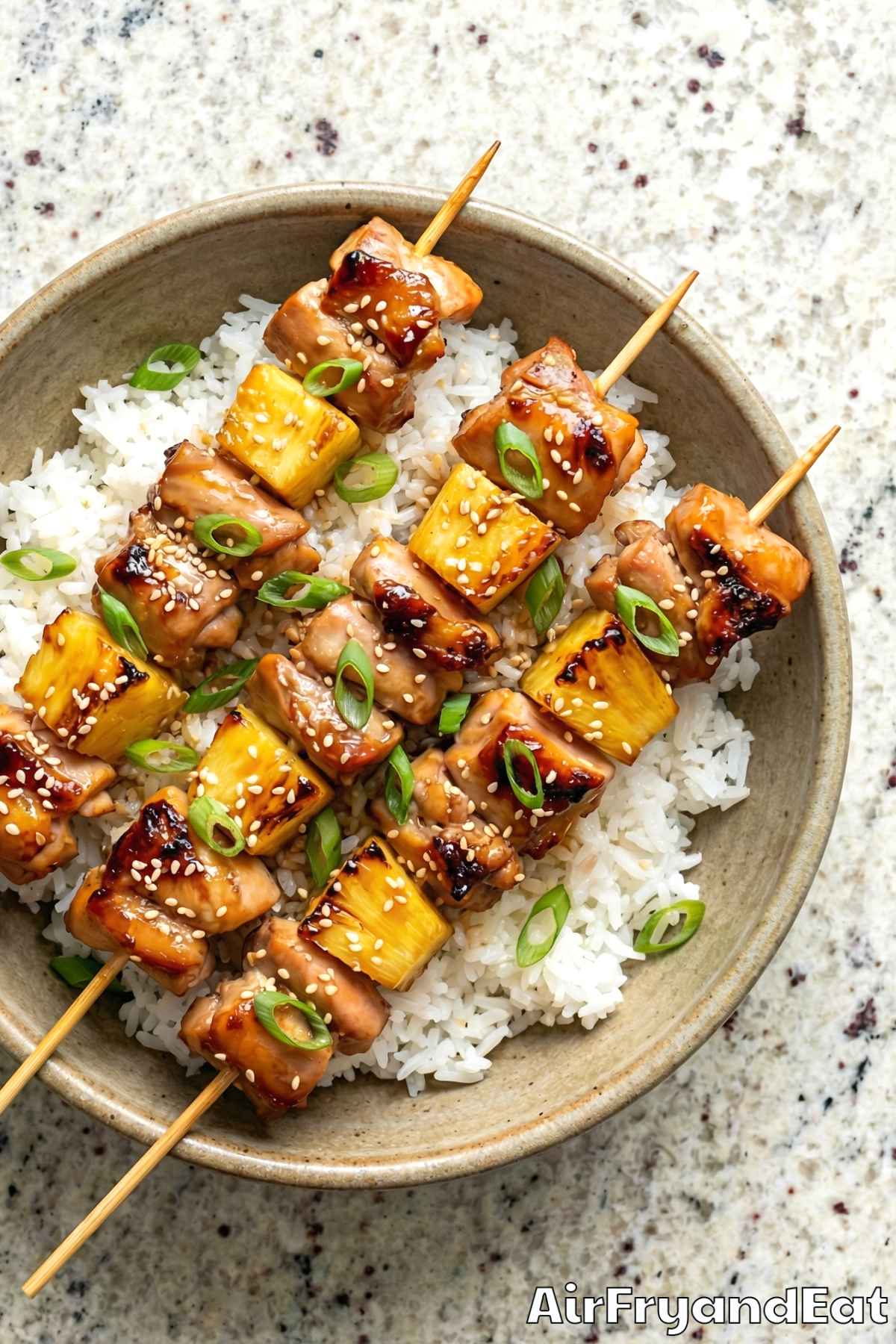 Golden air fryer pineapple teriyaki chicken skewers
