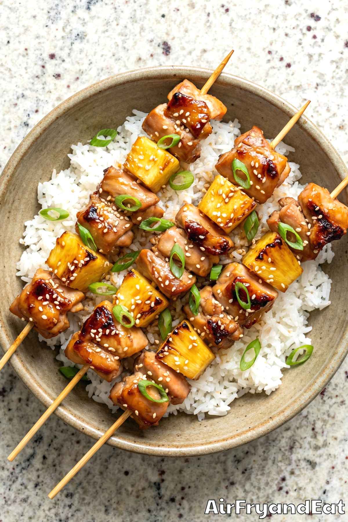 Tender teriyaki pineapple chicken skewers closeup