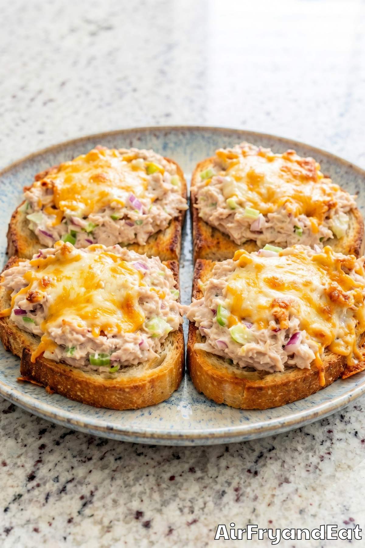 Toasty air fryer tuna melts on a board