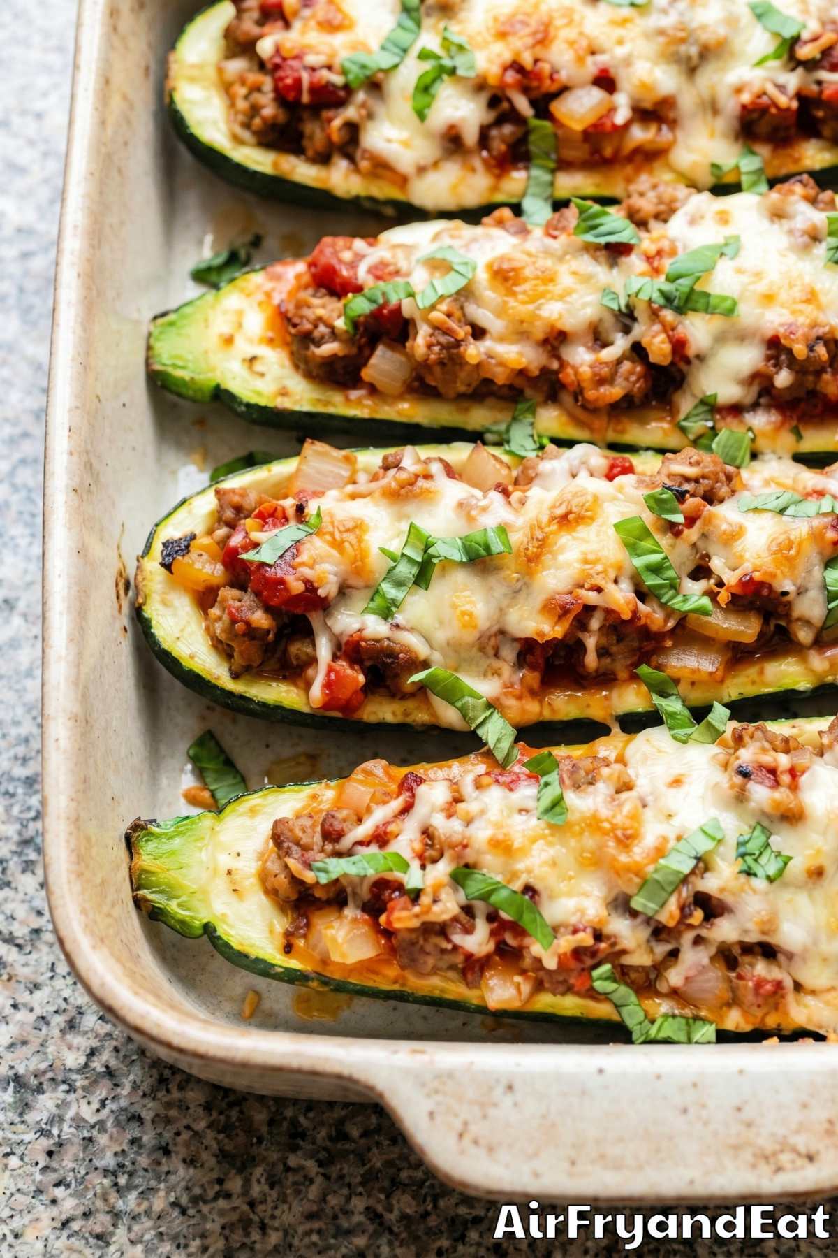 Cheesy air fryer zucchini boats fresh and hot