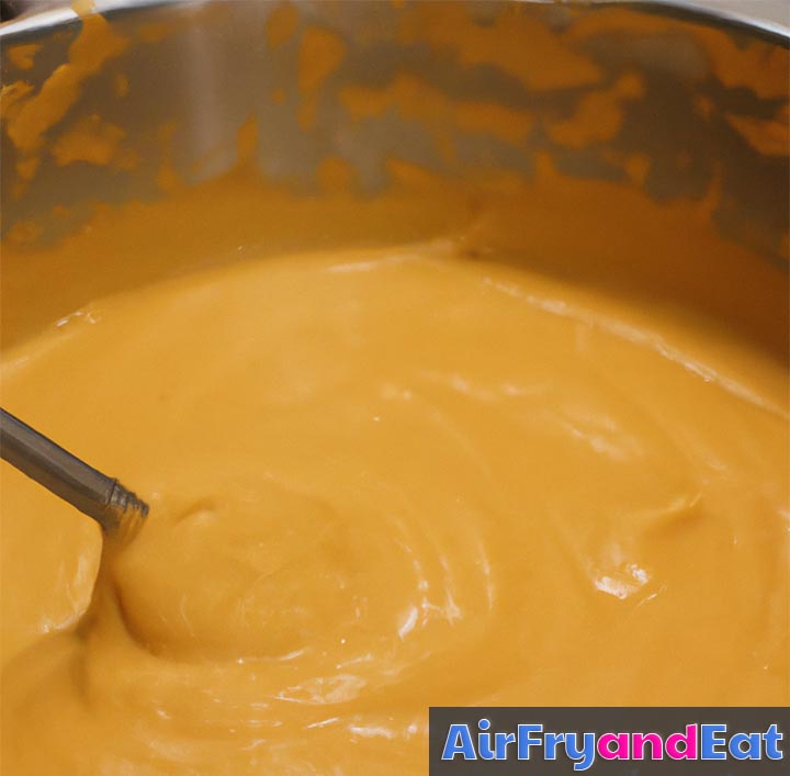 mixing pumpkin bread ingredients